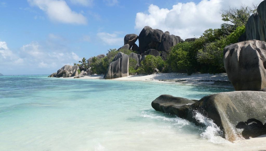 Famous saychell beach with rocks in the water